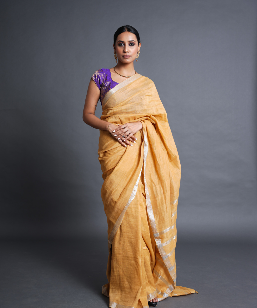Yellow handwoven linen zari saree