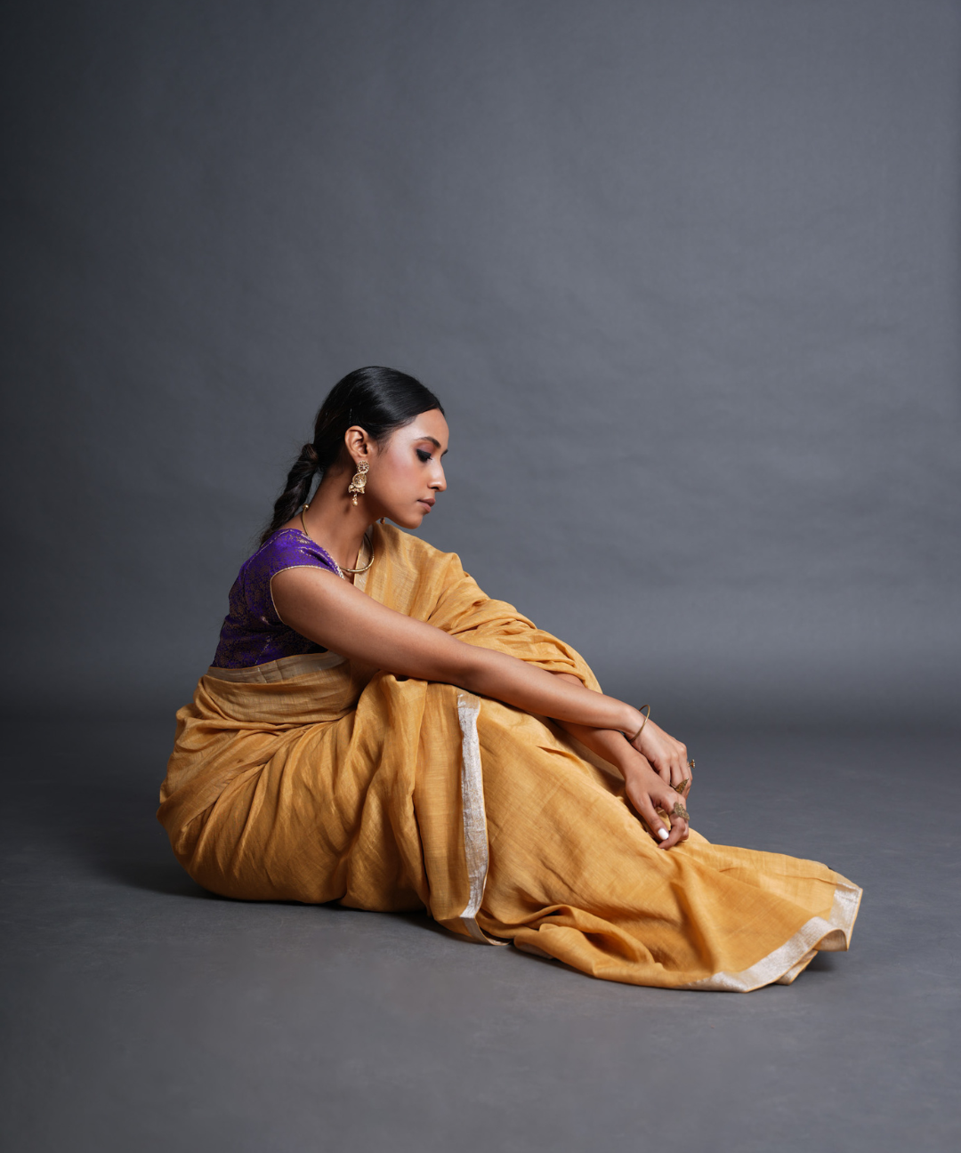 Yellow handwoven linen zari saree