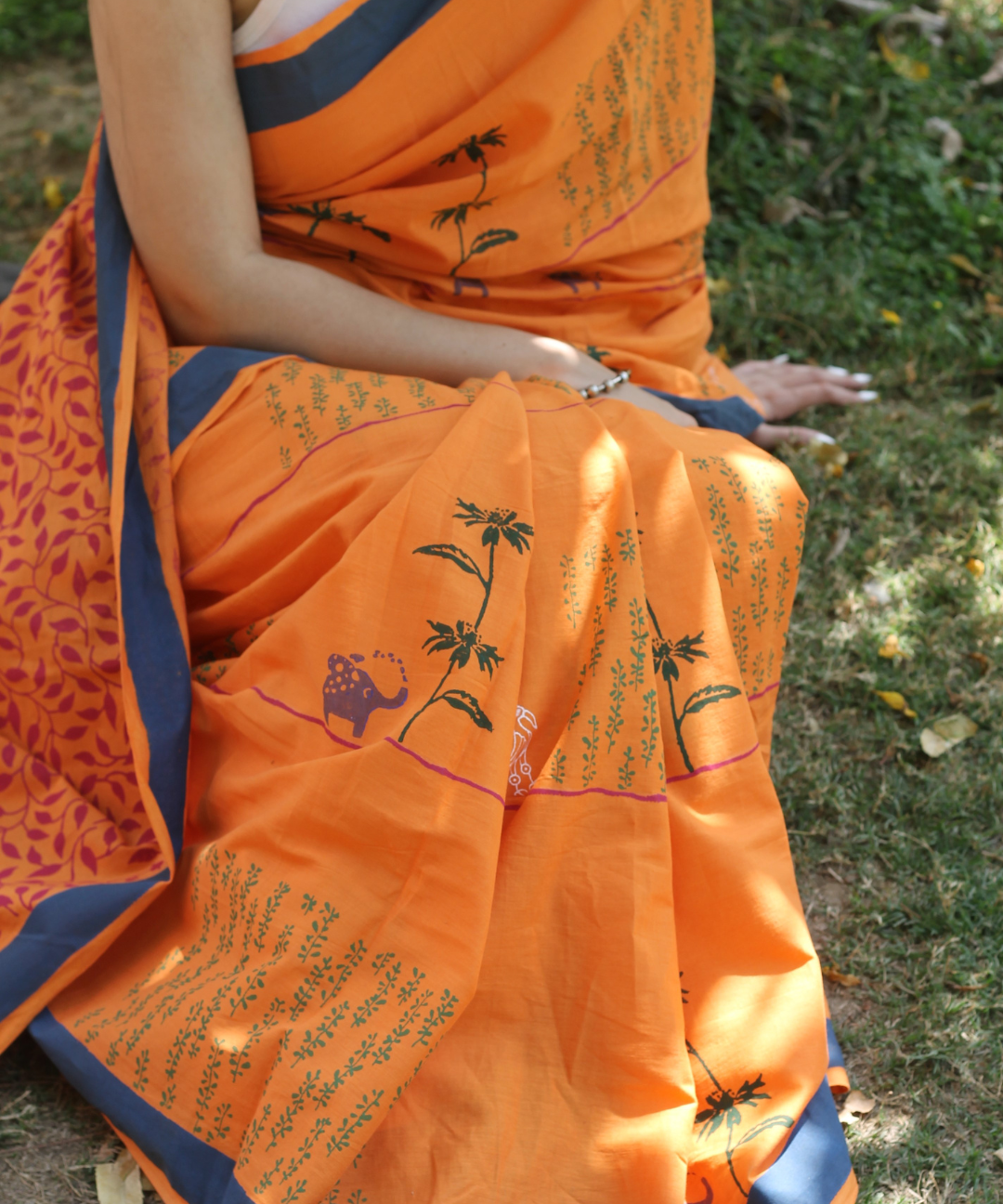 Orange summer candy block printed mulmul saree