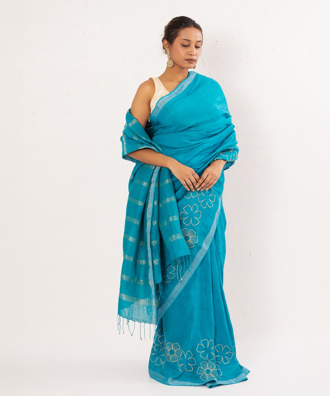 Blue handwoven linen embroidered saree