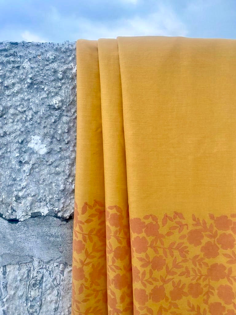 Mustard yellow cotton mulmul blockprinted saree