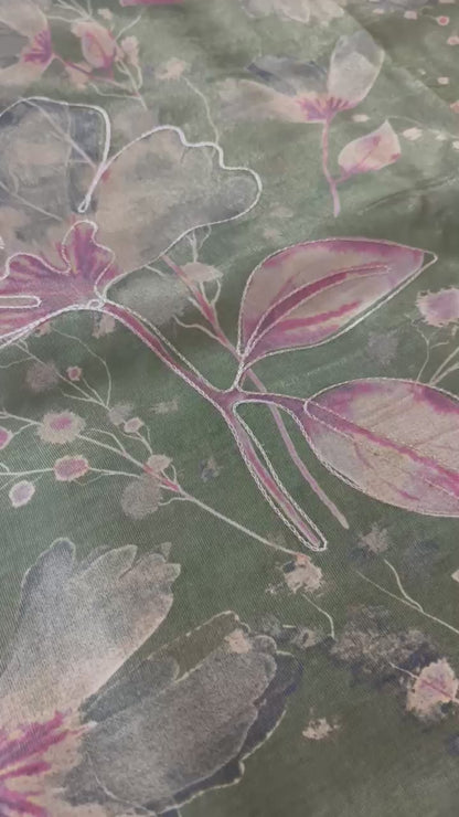 Green abstract tissue silk saree